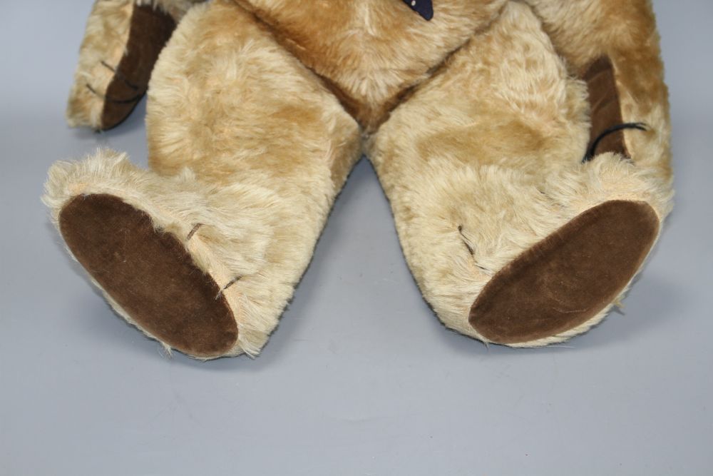 A 1950s Chad Valley bear, 26in., arm label, velvet pads